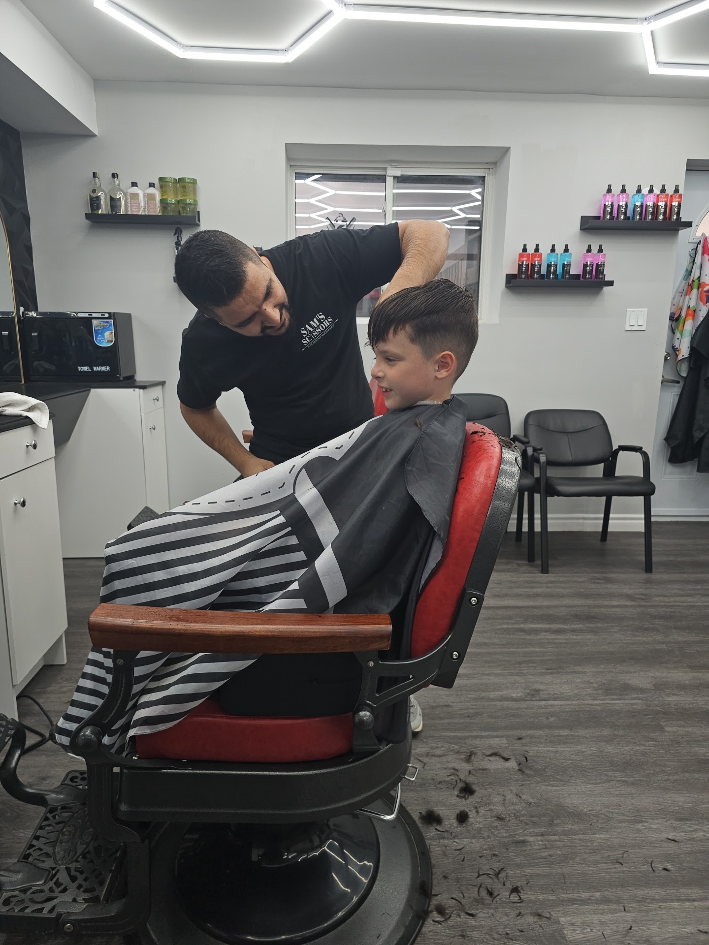 Straight-razor line-up and finish at Sam's Scissors, St. Catharines