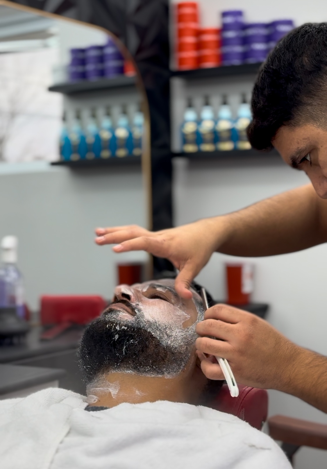 Fresh fade haircut at Sam's Scissors