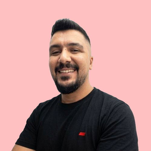 Sam, owner and barber at Sam's Scissors